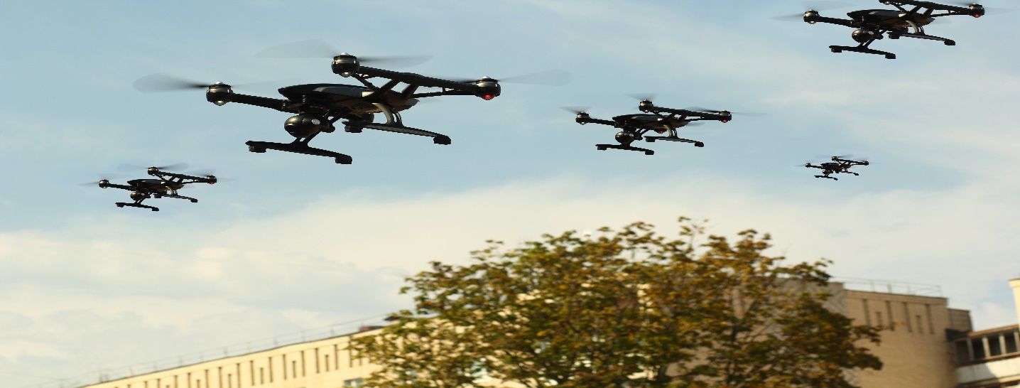 A group of airplanes flying in the sky  Description automatically generated with medium confidence
