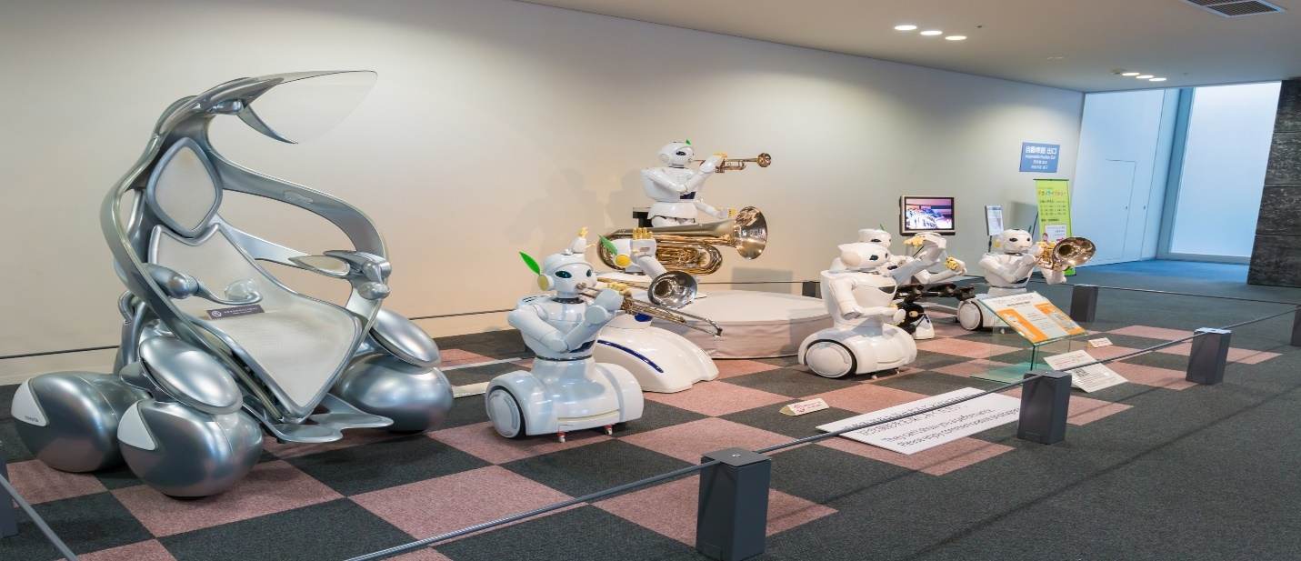 A group of toy figurines on a table  Description automatically generated with low confidence