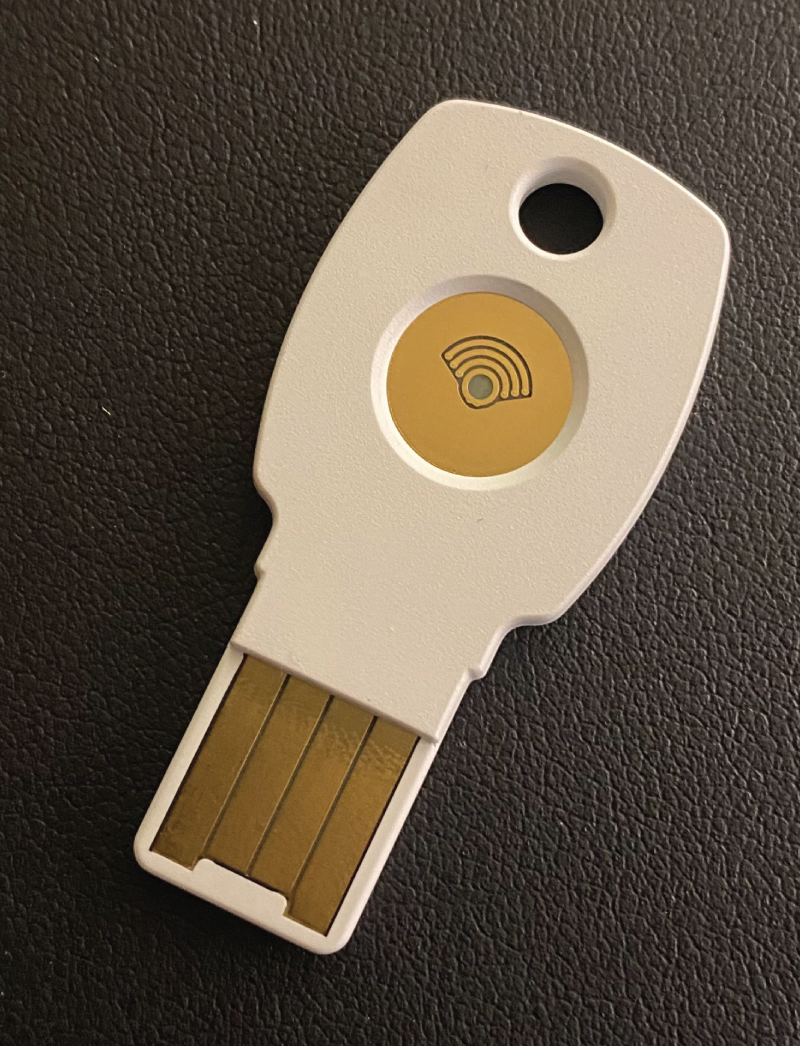 Photo depicts a Titan key USB security key.