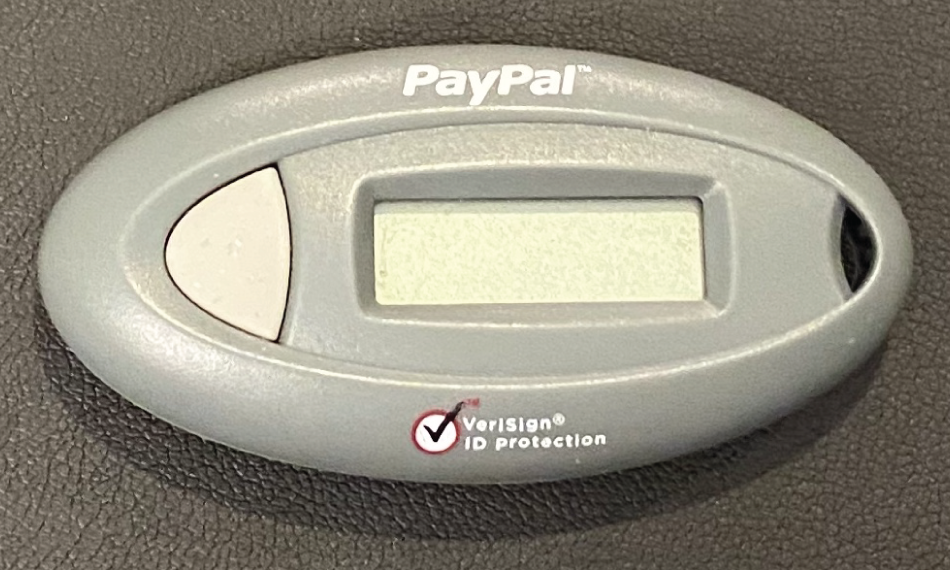 Photo depicts an HOTP PayPal token.